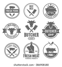 Butcher shop, premium quality meat, beef and pork set of vector monochrome vintage labels, badges, emblems and logos isolated on white background