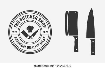 The Butcher Shop vintage logo design with meat cleaver and chef knife isolated on white background. Vector illustration