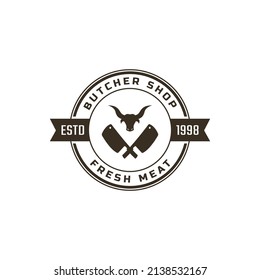 Butcher Symbol with Cleaver and Cow's Head Silhouette Badge Logo Vector Design Inspiration