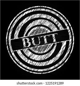 Butt written on a chalkboard