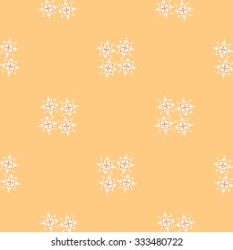Butter cream colored simple geometric pattern with snowflakes. Abstract pattern for wallpapers, covers, web page backgrounds. Vector fabric texture.