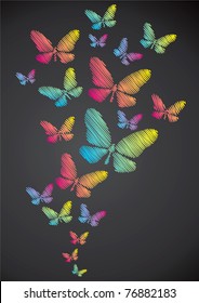 Butterflies drawn in chalk on a blackboard