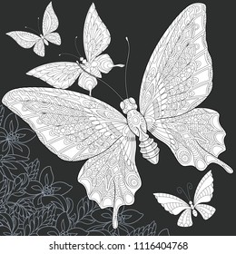 Butterflies drawn in line art style. Floral background in black and white colors on chalkboard. Coloring book. Coloring page. Zentangle vector illustration.