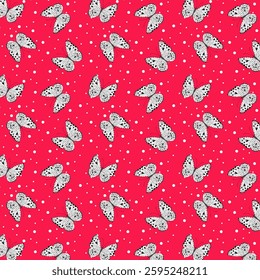 Butterflies on a pink background.Vector seamless pattern with white butterflies on a pink polka dot background.