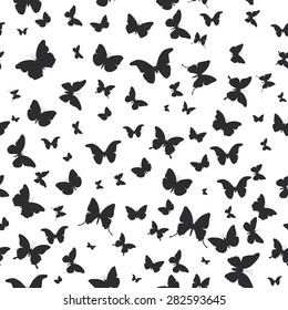 butterflies set isolated silhouette seamless pattern on white background. Vector