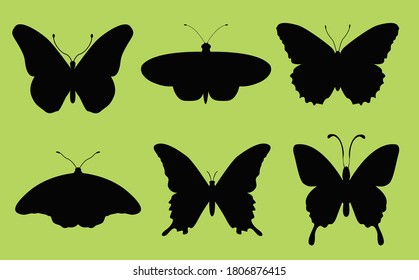 Butterflies silhouettes Collection on green blackground, vector design.