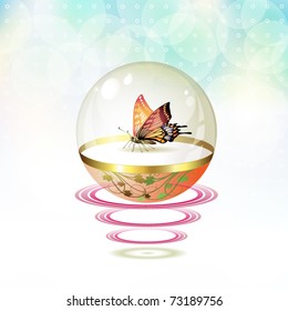 Butterfly isolated in glass globe suspended with waves