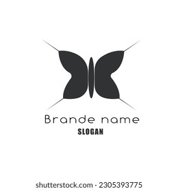 Butterfly logo vector in dark gray on a white background. Logo for a cosmetic brand, designer clothing, spa salon