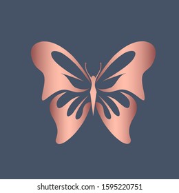 Butterfly logo.Beautiful, decorative icon with ornamental wings.Creative flying shape in rose gold metallic color isolated on dark background.Beauty,spa,fashion,luxury boutique,elegant art style.