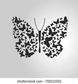 Butterfly made out of Lots of Small black Butterflies. 