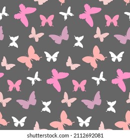 Butterfly pattern. Seamless background with pink and white butterflies on a gray background. Vector.