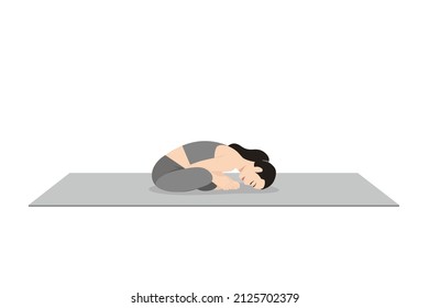 Butterfly Pose A. Beautiful girl practice Baddha Konasana A. Young attractive woman practicing yoga exercise. working out, black wearing sportswear, grey pants and top, indoor full length, calmness