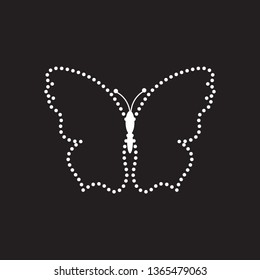 Butterfly shape from black stones