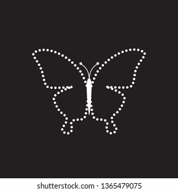 Butterfly shape from black stones