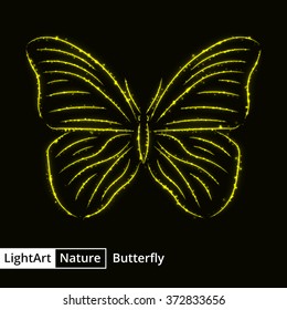 butterfly silhouette of yellow lights on black background