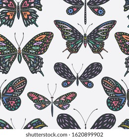 Butterfly silhouettes seamless pattern on white background. Hand drawn vector illustration in folk style for textile, party paper, wallpaper design.