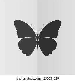Butterfly vector icon. Effect of folded paper. Flat design