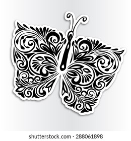 Butterfly.A monochrome image.Stylized patterned image of a butterfly.Sketch for tattoo. Preparation for wall deco.