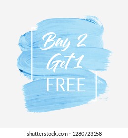 Buy 2 Get 1 Free sale text over watercolor brush paint stroke background vector. 
