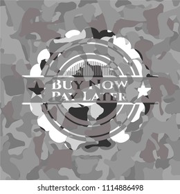 Buy Now Pay Later written on a grey camouflage texture