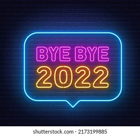 Bye bye 2022 neon sign in the speech bubble on brick wall background.