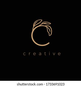 C LETTER LOGO LUXURY WITH DRAWING LEAF
