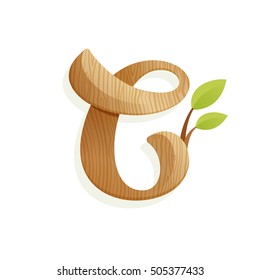 C letter logo with wood texture and green leaves. Vector elements for ecology poster, t-shirts and cards.