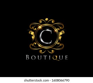 C Luxury Boutique Logo Icon,  C Letter   With Golden Shine On Classy Badge Design.  