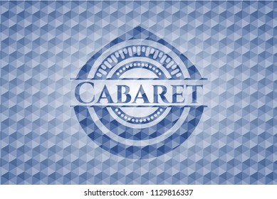 Cabaret blue badge with geometric pattern background.