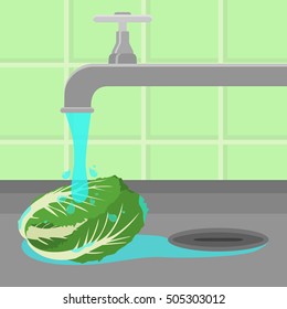 Cabbage being cleaned and washed in a sink in a kitchen. Running tap water.