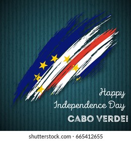 Cabo Verde Independence Day Patriotic Design. Expressive Brush Stroke in National Flag Colors on dark striped background. Happy Independence Day Cabo Verde Vector Greeting Card.