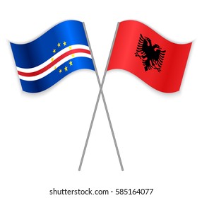 Cabo Verdean and Albanian crossed flags. Cape Verde combined with Albania isolated on white. Language learning, international business or travel concept.