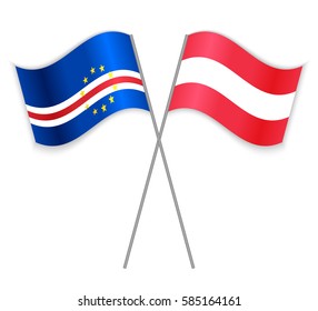 Cabo Verdean and Austrian crossed flags. Cape Verde combined with Austria isolated on white. Language learning, international business or travel concept.