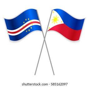 Cabo Verdean and Filipino crossed flags. Cape Verde combined with Philippines isolated on white. Language learning, international business or travel concept.