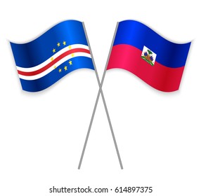 Cabo Verdean and Haitian crossed flags. Cabo Verde combined with Haiti isolated on white. Language learning, international business or travel concept.