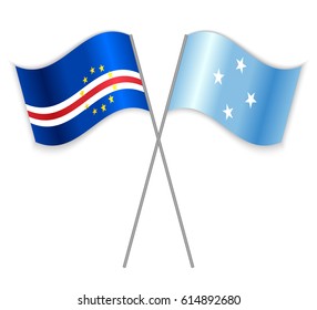 Cabo Verdean and Micronesian crossed flags. Cabo Verde combined with Micronesia isolated on white. Language learning, international business or travel concept.