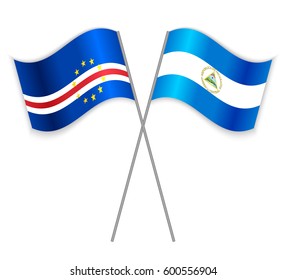 Cabo Verdean and Nicaraguan crossed flags. Cape Verde combined with Nicaragua isolated on white. Language learning, international business or travel concept.