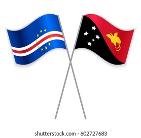 Cabo Verdean and Papuan crossed flags. Cape Verde combined with Papua New Guinea isolated on white. Language learning, international business or travel concept.