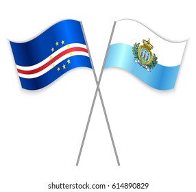 Cabo Verdean and Sammarinese crossed flags. Cabo Verde combined with San Marino isolated on white. Language learning, international business or travel concept.