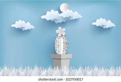 cactus with paper art design. background with blue sky view