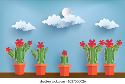 cactus with paper art design. background with blue sky view