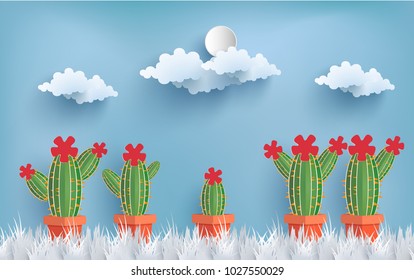 cactus with paper art design. background with blue sky view