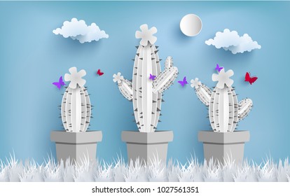 cactus with paper art design. background with blue sky view