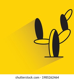 cactus shadow on yellow background