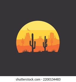 Cactus silhouette  in the middle of wild west dessert with sunset mountain and canyon background