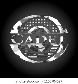 Cadet written on a grey camouflage texture
