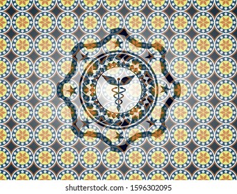 Caduceus medical icon inside arabesque style badge. arabic decoration.