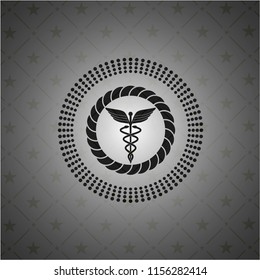 Caduceus medical icon inside black emblem. Vintage.