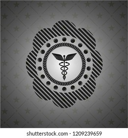 Caduceus medical icon inside black emblem. Vintage.