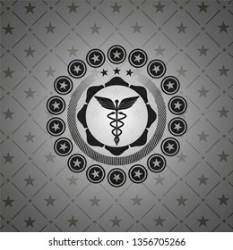 Caduceus medical icon inside black emblem. Vintage.